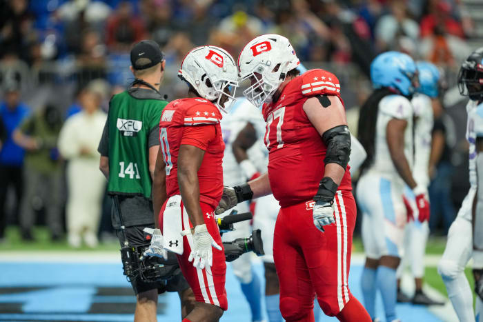 May 13, 2023; San Antonio, TX, USA; DC Defenders wide receiver Josh Hammond (0) celebrates his touchdown with offensive lineman Liam Fornadel (77) in the second half at the Alamodome. Mandatory Credit: Daniel Dunn-USA TODAY Sports